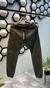 ESSENTIALS LOGO EMBOSSED PREMIUM GREY JOGGERS