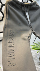 ESSENTIALS LOGO EMBOSSED PREMIUM GREY JOGGERS