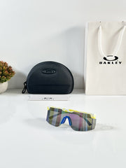 Oakley 9957 Yellow Blue Revo