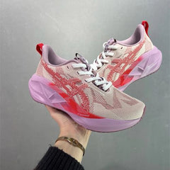 Asics Novablast 5 Running Trainers in pink and red