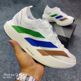 Adidas adizero adios pro evo 1 pharrell earth sneakers