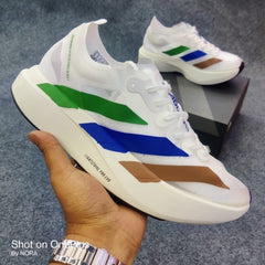 Adidas adizero adios pro evo 1 pharrell earth sneakers