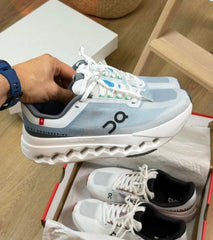 On Cloud surfer Next Niagra White