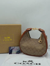 Coach Small Jonie 22 Half Moon Leather Shoulder Bag In Signature Canvas & Brown 088