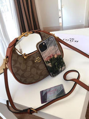 Coach Small Jonie 22 Half Moon Leather Shoulder Bag In Signature Canvas & Brown 088