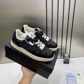 WMN Coach Clip Court Sneaker in the black signature canvas and leather