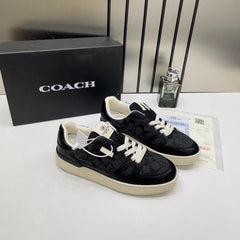 WMN Coach Clip Court Sneaker in the black signature canvas and leather