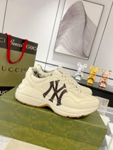 Gucci Rhyton Leather Sneakers with the New York Yankees logo
