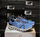 On Cloud surfer Trail running shoe in the Niagara Glacier
