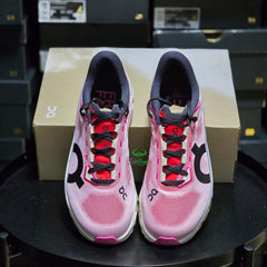 On Cloud monster Hyper running shoes in a red cream