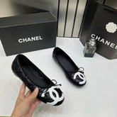 Chanel Quilted Cambon Leather Ballet Flats In Black & White With White Toe Bow With OG Box & Carry Bag
