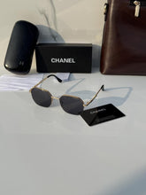 Chanel 507 gold black