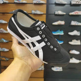 Onitsuka Tiger Mexico 66 SlipOn Black White Girls D 1866