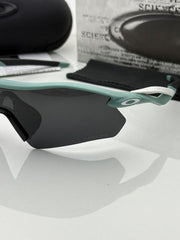 Oakley 9495 blue black prizm polarized lens