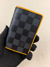 Louis Vuitton Pocket Organizer Wallet Damier Graphite Canvas Yellow Leather Lining And Multiple Card Slots Black Square Yellow N64502 Yellow