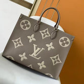Louis Vuitton On The Go Big MM Bicolor Monogram Handbag With Dust Cover & Carry Bag Khakhi M45320