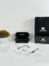 Miu Miu WMNS 1025 Black Day Night Colour Changing Glass