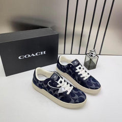 WMN Coach Clip Court Sneaker Navy signature canvas