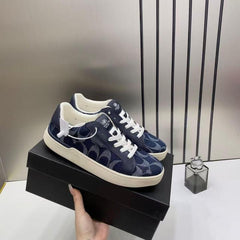 WMN Coach Clip Court Sneaker Navy signature canvas