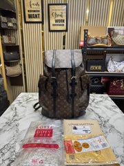 Louis Vuittion Christopher Monogram Taurillon Leather Backpack (Brown)