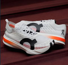 On Cloudboom Strike White Orange