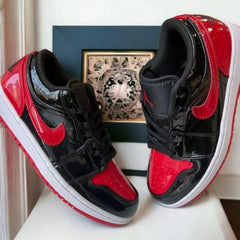 JORDAN RETRO 1 LOW PATENT BRED