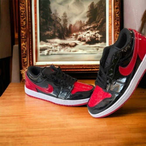 JORDAN RETRO 1 LOW PATENT BRED