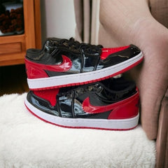 JORDAN RETRO 1 LOW PATENT BRED