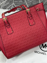 Michael Kors 4-3 Maroon Voyager Emboss Monogram With DustCover