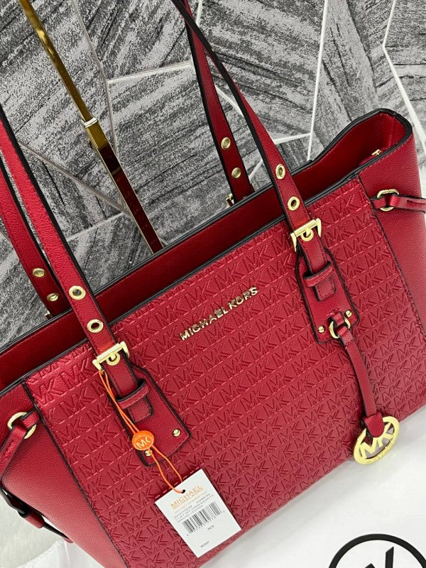 Michael Kors 4-3 Maroon Voyager Emboss Monogram With DustCover