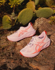 Asics Novablast 5 Running Trainers in pink and red