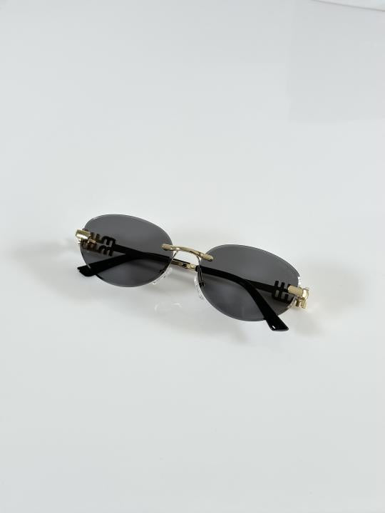Miu Miu WMNS 1025 Gold Black