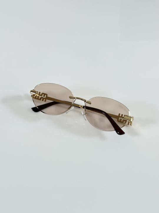 Miu Miu WMNS 1025 Gold candy
