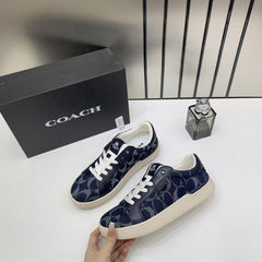WMN Coach Clip Court Sneaker Navy signature canvas