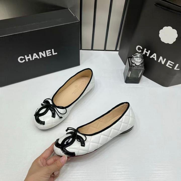 Chanel Quilted Cambon Leather Ballet Flats In White & Black With black Toe Bow With OG Box & Carry Bag