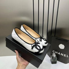 Chanel Quilted Cambon Leather Ballet Flats In White & Black With black Toe Bow With OG Box & Carry Bag