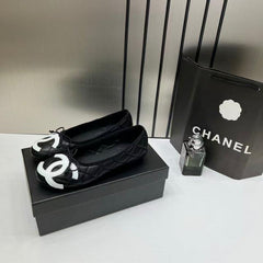 Chanel Quilted Cambon Leather Ballet Flats In Black & White With White Toe Bow With OG Box & Carry Bag