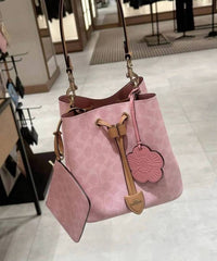 Coach Rowan Bucket Bag Signature Canvas with Charms in Powder Pink With OG Box Dust Cover Pink