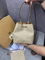 Coach Rowan Signature Khakhi Brown Bucket Bag With Small Removable Zip Pouch With OG Box & Dust cover Khakhi Brown