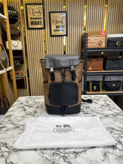 Coach Signature Canvas Charter Backpack with Black Leather Flap Dual Buckle Closures & Front Zip Pocket (058)