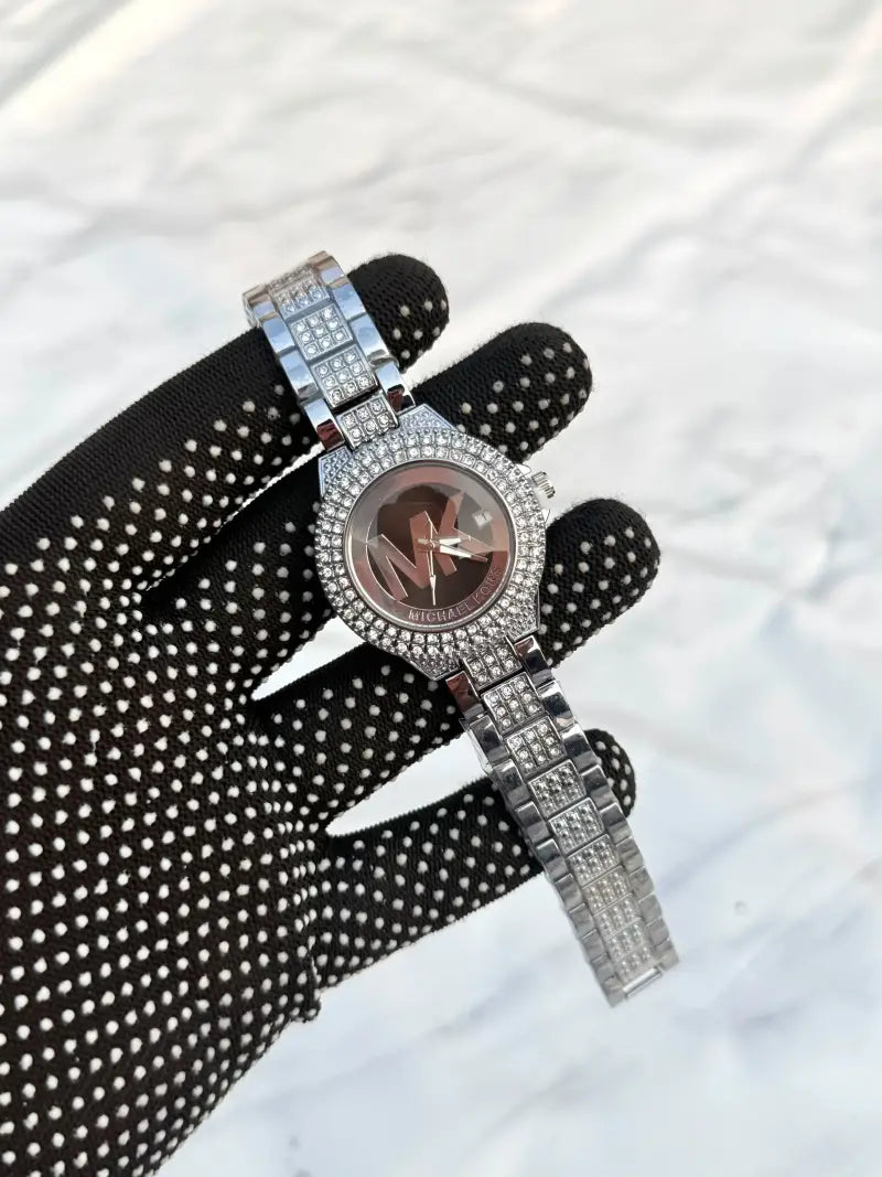 Michlae Kors Detactive