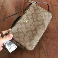 Coach Mini Sling Bag