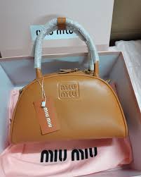 Miu Miu Embossed Logo Medium Tote Bag With Dust Bag (3005 Brown)