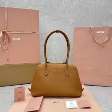 Miu Miu Embossed Logo Medium Tote Bag With Dust Bag (3005 Brown)